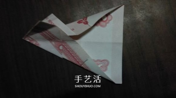 The origami method of the five-petal lotus illustrates the steps of folding the five-petal lotus with paper money