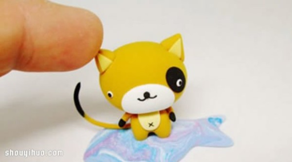 Illustrated tutorial on hand-making cute cartoon cat figures with ultra-light clay