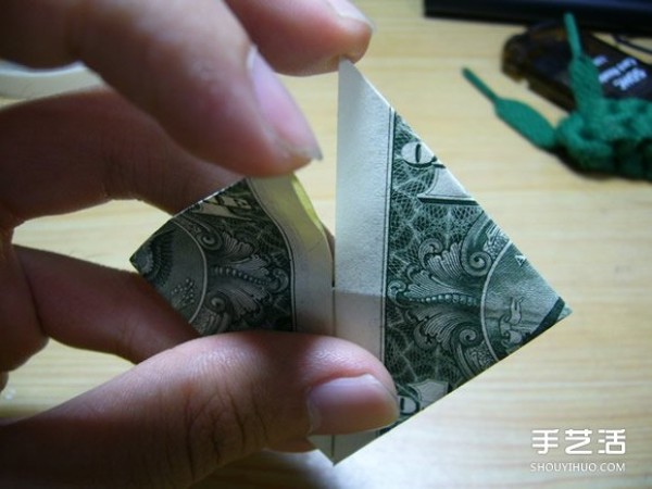 One dollar bill, folding into a heart illustration, illustration of the origami method of a dollar heart