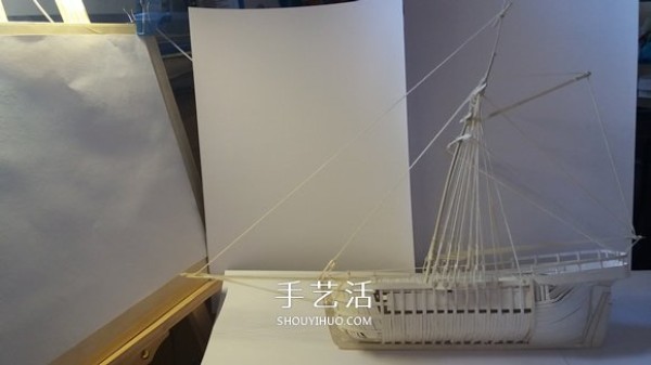 Paper sloop model is made of exquisite cardboard sailboat, handmade