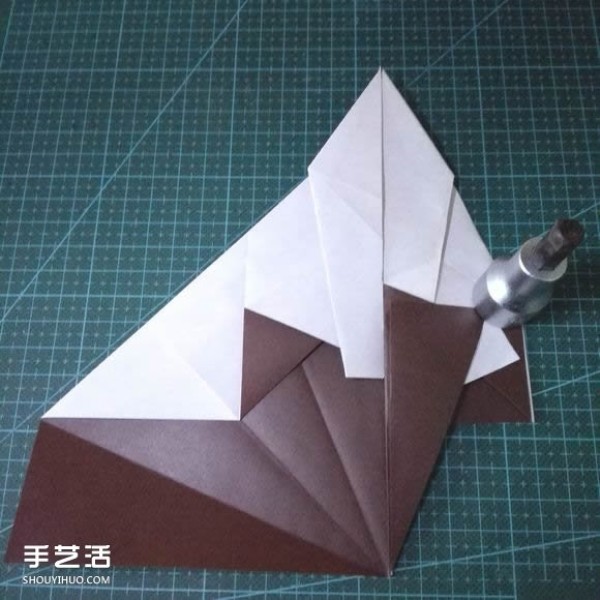 Handmade origami fish fish illustrates how to fold a complex tropical horsefish