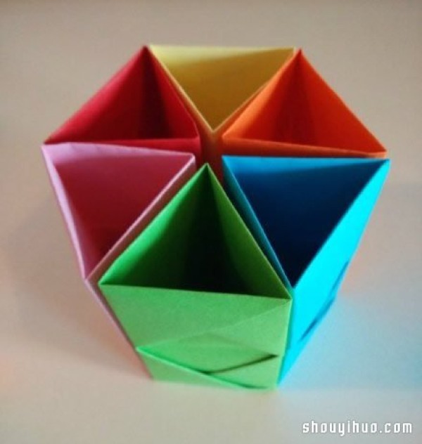 An illustrated tutorial on how to fold a six-hole pen holder origami to make a colorful pen holder