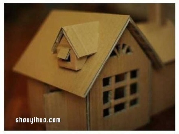 Want to live in a house model made from discarded cardboard boxes? 