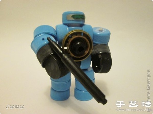 Plastic bottle caps are turned into treasures to make handmade RoboCop toys