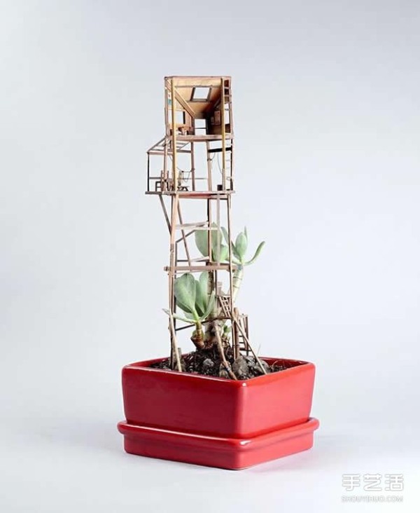 DIY exquisite treehouse model on a potted plant, a Lilliputian-like miniature building