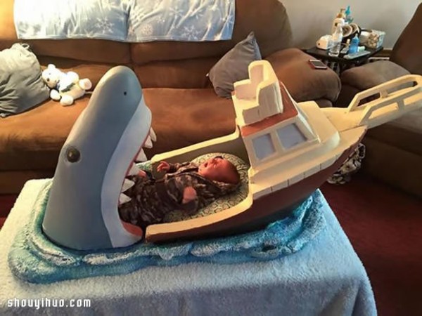 The warmest gift for your nephew is a great white shark engraved crib