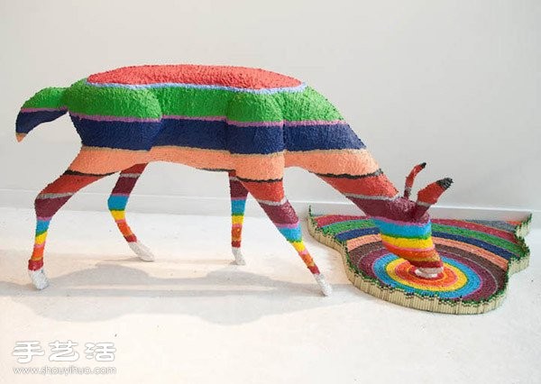 A three-dimensional sculpture made by hand using pencils and pastels