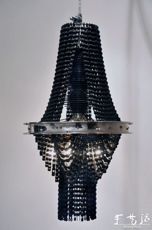 DIY chandelier for old car chains and wheels