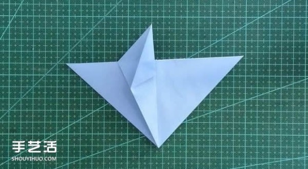 Handmade origami girls head illustration, step-by-step folding method for a girl with short hair