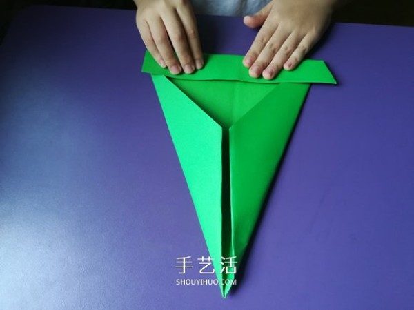 An eight-year-old boys origami sharing an illustrated tutorial on an origami fighter jet