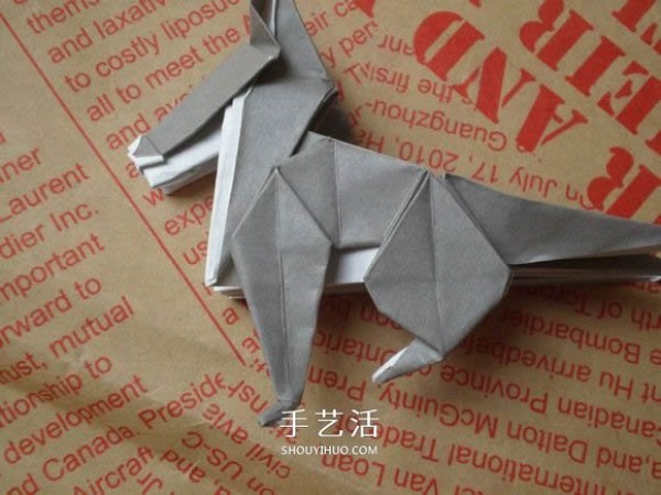 Illustrations of how to fold a cute puppy. Step-by-step pictures of origami puppies.