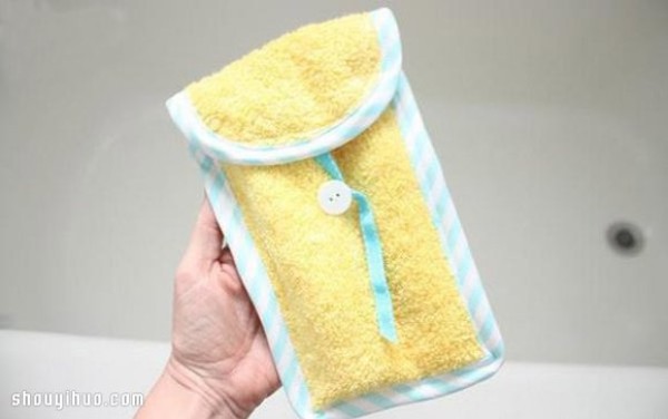 Old towels are repurposed and handmade to make toiletry storage bags