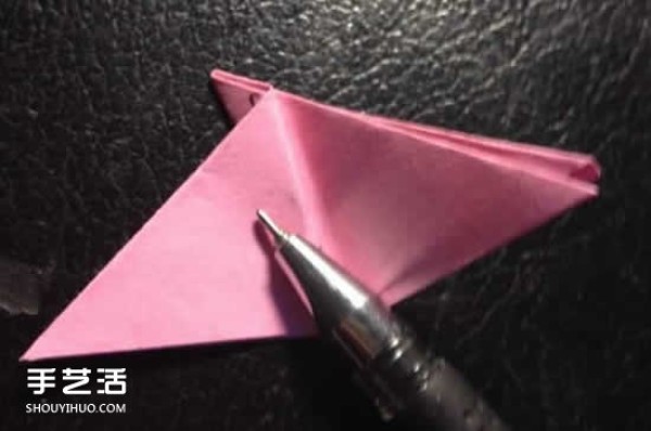 How to fold a four-petaled flower with illustrated steps. How to make an origami four-petaled flower by hand