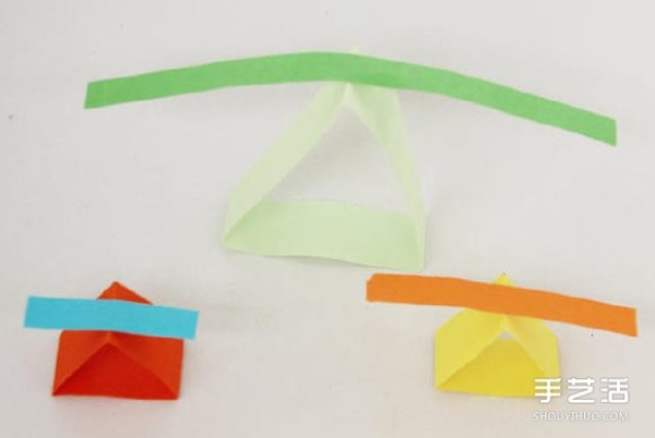 The balancing triangle game trains childrens concentration and patience