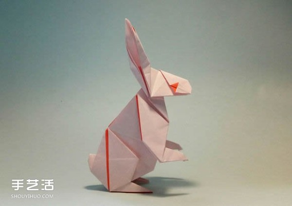 The folding method of a standing rabbit illustrates the steps of folding a rabbit by hand