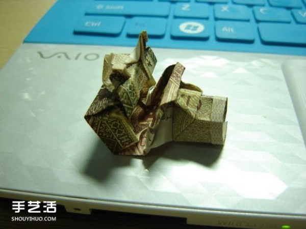 Illustration of paper money origami camera, detailed explanation of folding method of U.S. dollar folding camera