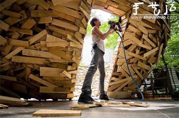 10,000 wooden planks are used to make a DIY birds nest-shaped building