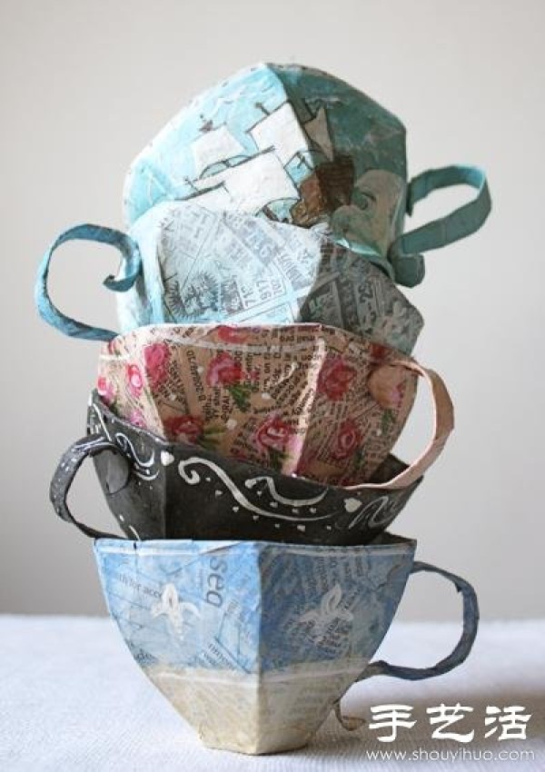 Using waste packaging boxes to make hand-made tea cup models