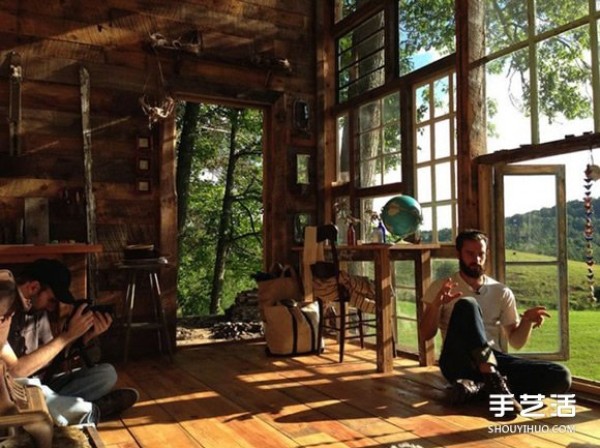 A dreamy lakeside house made up of all kinds of old windows