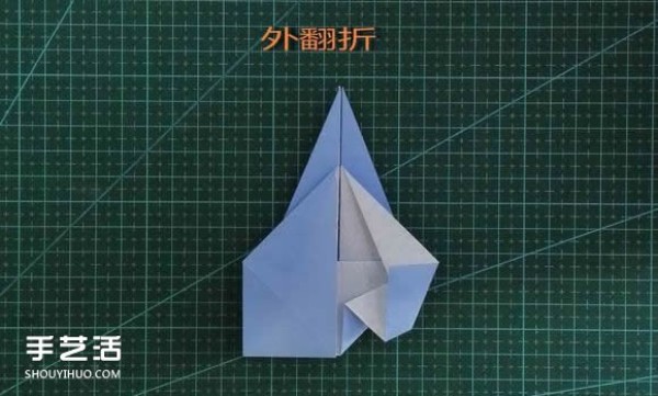 Handmade origami girls head illustration, step-by-step folding method for a girl with short hair