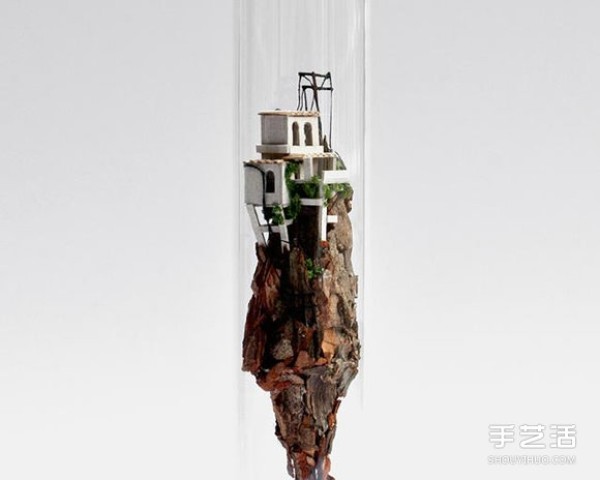 Cardboard and branches turn waste into treasure, the world in DIY glass test tubes