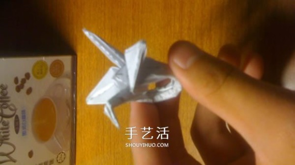 How to do itIllustrated process of making origami crane rings