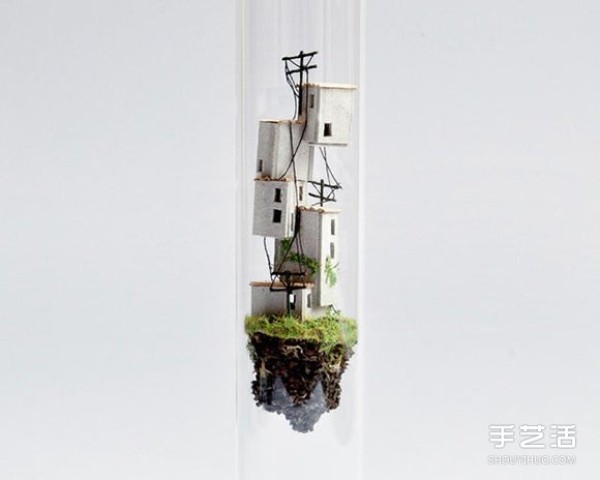 Cardboard and branches turn waste into treasure, the world in DIY glass test tubes