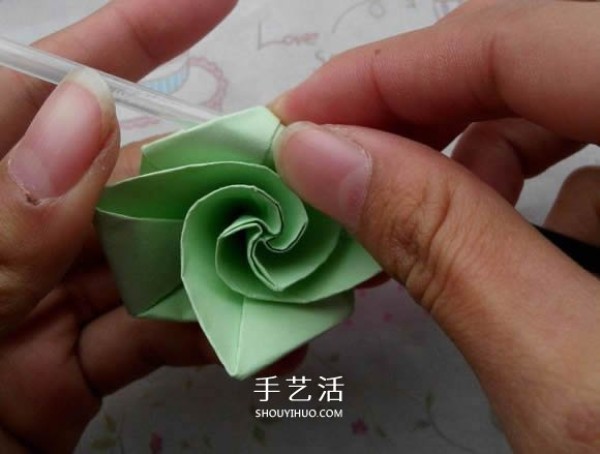 A tutorial on how to fold a diamond rose and a tutorial on how to fold a diamond rose