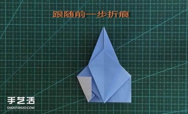 Handmade origami girls head illustration, step-by-step folding method for a girl with short hair