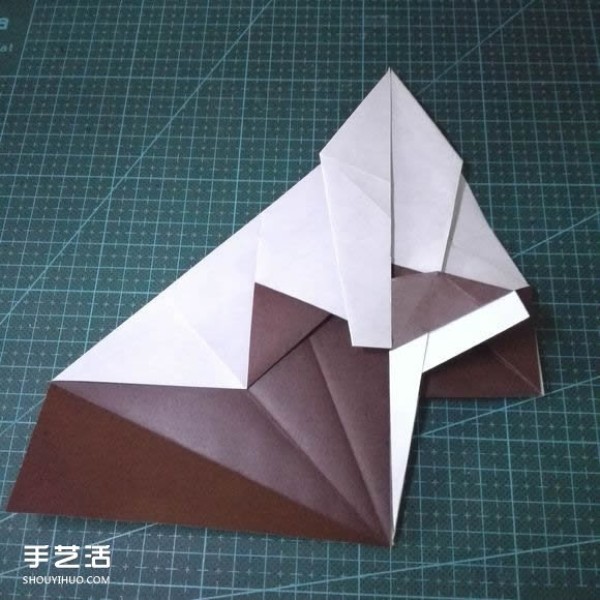 Handmade origami fish fish illustrates how to fold a complex tropical horsefish