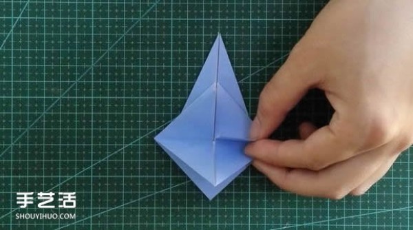 Handmade origami girls head illustration, step-by-step folding method for a girl with short hair