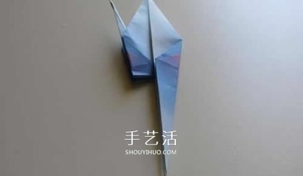 A step-by-step modification of the origami crane to make a three-dimensional red-crowned crane