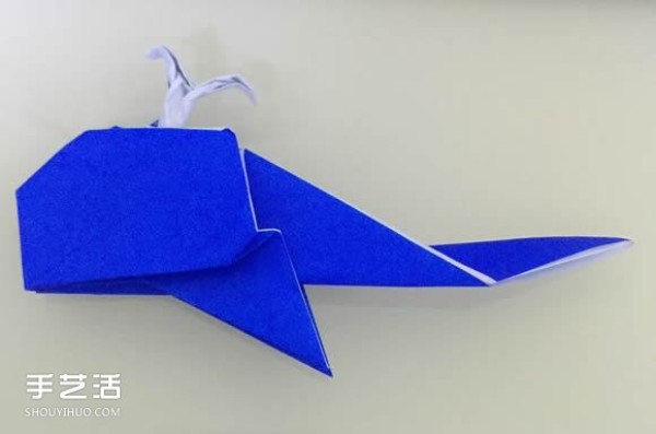 Illustration of the folding method of a spouting whale, step-by-step process of origami three-dimensional whale