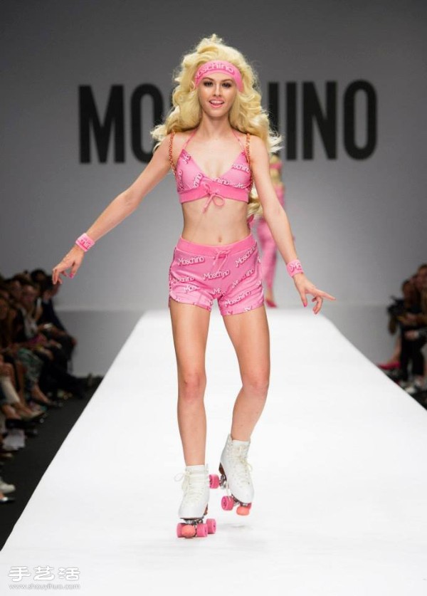 Barbie appears on the 2015 Milan Fashion Week spring and summer womens wear catwalk