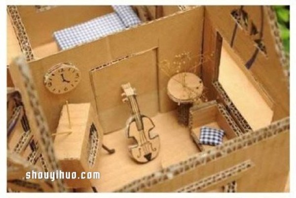 Want to live in a house model made from discarded cardboard boxes? 