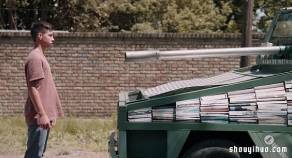 An old car was converted into a tank and turned into a mobile library