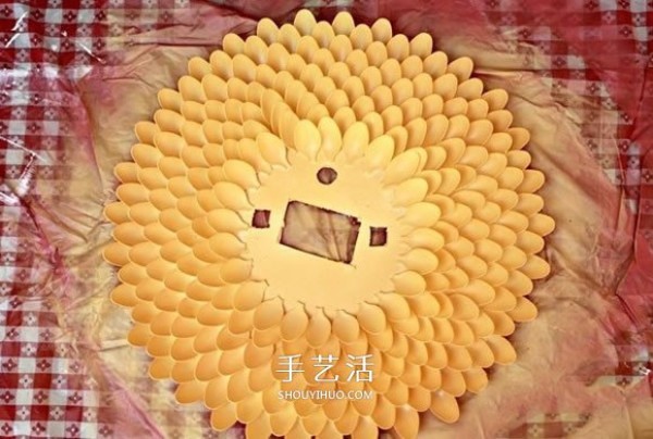 Illustration of hand-made beautiful wild chrysanthemum wall clock with disposable spoon