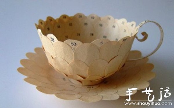 Recycling book pages to make exquisite hand-made tea cups