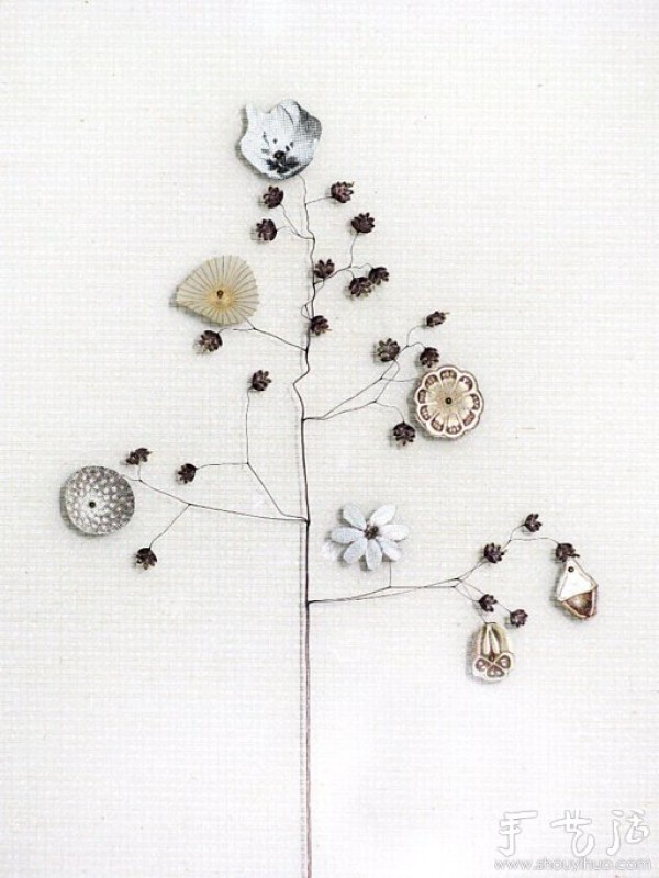 Exquisite DIY paper art works of paper flowers and branches