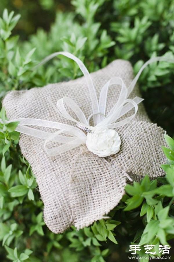 Handmade linen ring pillows commonly seen in forest weddings