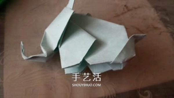 How to fold a three-dimensional elephant with diagrams and instructions for folding origami and a standing elephant