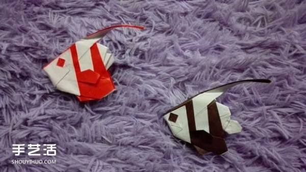 Handmade origami fish fish illustrates how to fold a complex tropical horsefish