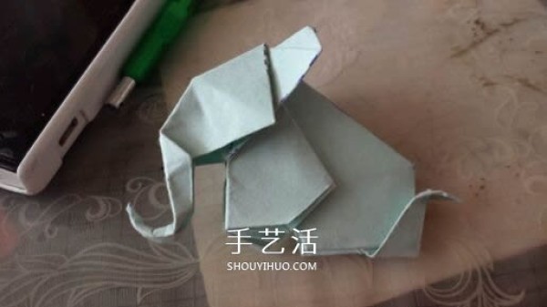 How to fold a three-dimensional elephant with diagrams and instructions for folding origami and a standing elephant