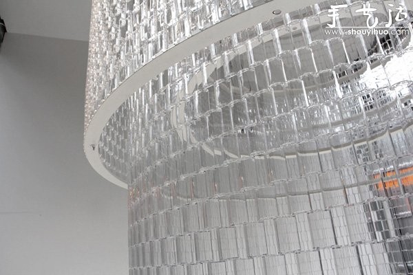 A giant chandelier made of transparent Lego bricks