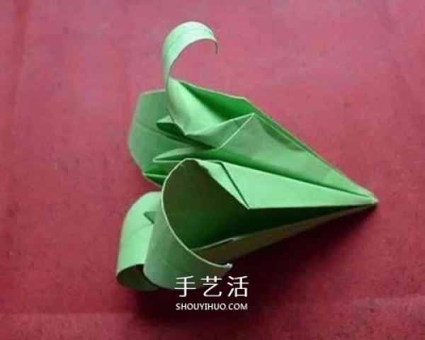 Hand-folding lilies illustrates the steps of folding a simple paper lily