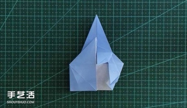 Handmade origami girls head illustration, step-by-step folding method for a girl with short hair