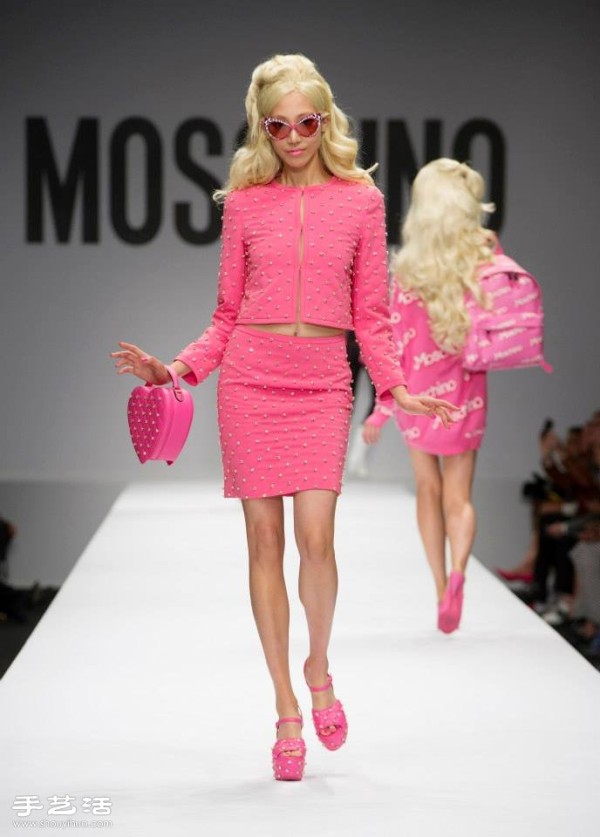 Barbie appears on the 2015 Milan Fashion Week spring and summer womens wear catwalk