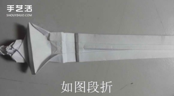 Illustration of how to fold a paper katana, step by step instructions for folding a Japanese sword