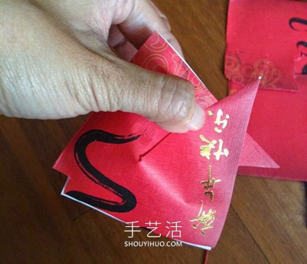 Tutorial on how to make handmade New Year red envelope fish in kindergarten