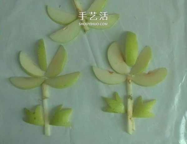 Simple pear handicraft method for children to use fruits to spell flowers